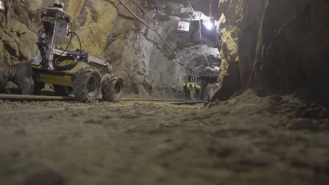Robotic Dog Traversing Mining Corridor During Military Search and Rescue Stock Footage 157411442