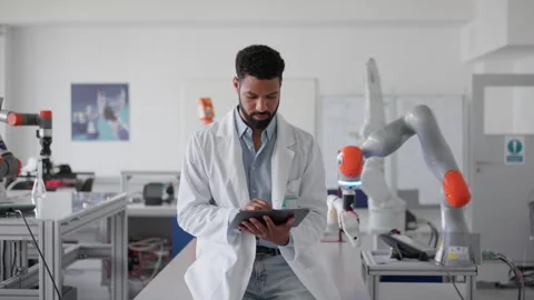 Robotic engineer working on robotic knee replacement surgery project. Concept of Stock Footage 277209312