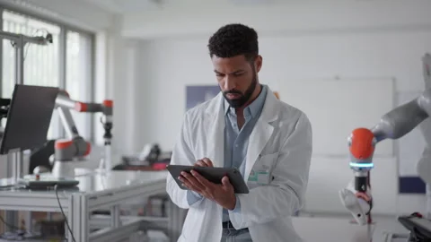 Robotic engineer working on robotic knee replacement surgery project. Concept of Stock Footage 277209389