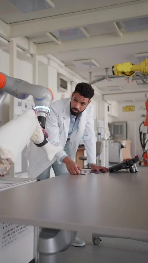 Robotic engineer working on robotic knee replacement surgery project. Concept of Stock Footage 277213102