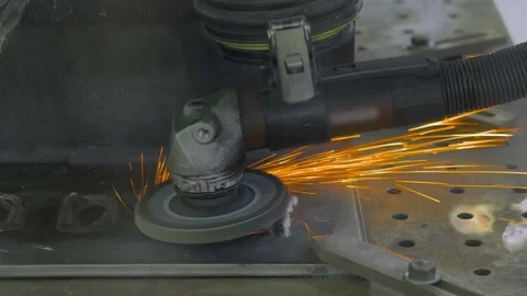 Robotic grinding system with angle grinder processes the metal material surface Stock Footage 337061648