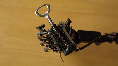 Robotic Hand Holding a Corkscrew Stock Footage 255167141