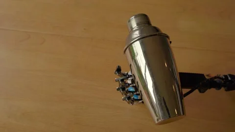 Robotic Hand Holding a Shaker Stock Footage 255167152