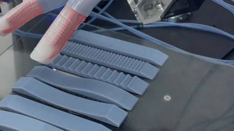 Robotic hand touching plain and zif-zag surface Stock Footage 93520743