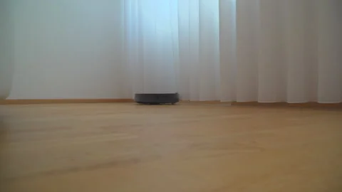 Robotic Hoover work in apartment Stock Footage 144964354