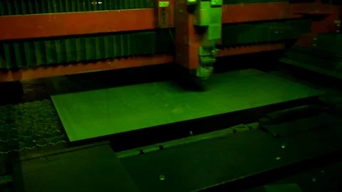 Robotic laser cutting with sparks Stock Footage 104719317