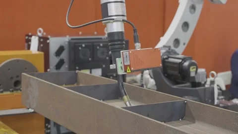 Robotic laser welding arm in automated manufacturing production line. Industr Stock Footage 337543584