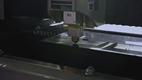 Robotic machine carves patterns on metal. Media. Artificial intelligence in Stock Photos