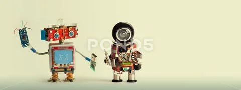 Robotic maintenance repair fix concept. Handyman robots, smiley red head, chip Stock Photos