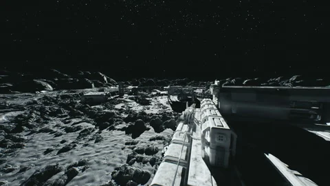 Robotic maintenance unit inspects moon habitat amid rugged terrain 스톡 동영상 331533782