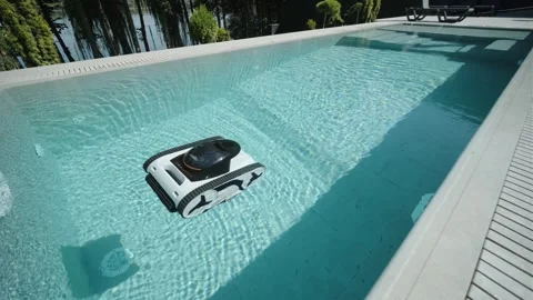Robotic Pool Cleaner in Outdoor Pool Stock Footage 318748567