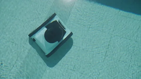 Robotic Pool Cleaner in Outdoor Pool Stock Footage 318748765
