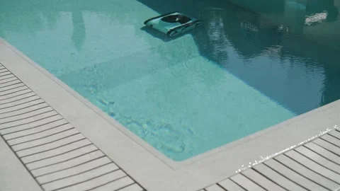 Robotic Pool Cleaner in Outdoor Pool Stock Footage 318748847