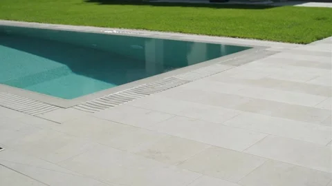 Robotic Pool Cleaner in Outdoor Pool Stock Footage 318748854