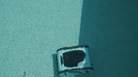 Robotic Pool Cleaner in Outdoor Pool Stock Footage 318748950