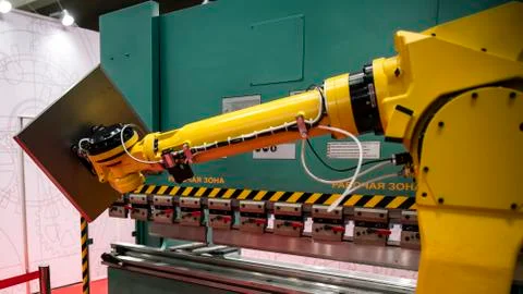 Robotic programmed robot arm. Industrial exhibition of machine tools. Foto stock
