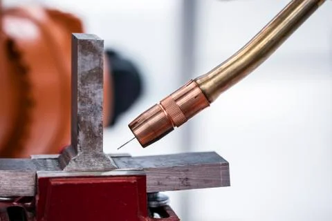 Robotic programmed robot arm. Industrial exhibition of machine tools. Stock Photos