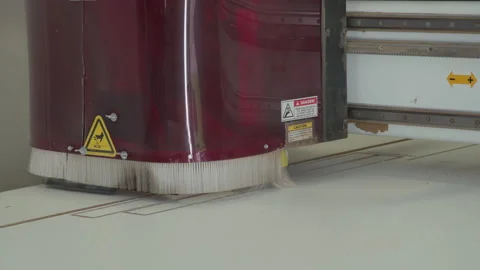 Robotic router cutting precision paths and pattern in board. Mechanical Stock Footage 130976164