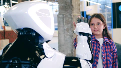Robotic science, technology, innovations concept. Robot touching hands with a Video stock 150795745