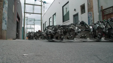 Robotic snake crawling in a road Stock Footage 93527126