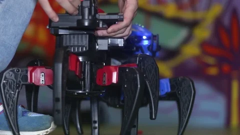 Robotic spider and a man Stock Footage 81790300