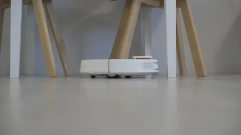 Robotic Vacuum Cleaner At Home Stock Footage 219811684