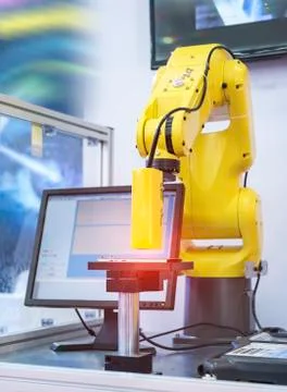 Robotic vision sensor camera system in mobile phone intellegence factory Stock Photos