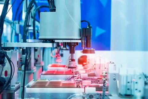 Robotic vision sensor camera system in intellegence pcb factory Stock Photos