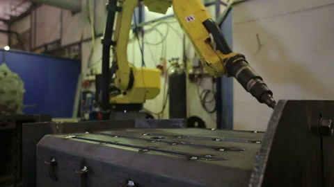 Robotic welding machine in the factory. Computer calculates the movement of a ro Stock Footage 199486785