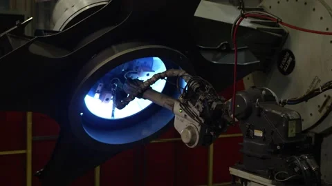 A robotic welding machine is welding an airlock for a spaceship Stock Footage 163335686