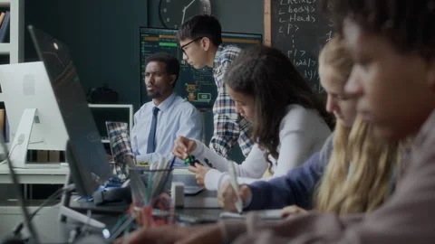 Robotics and Coding Lesson in Modern Classroom Stock Footage 284438763