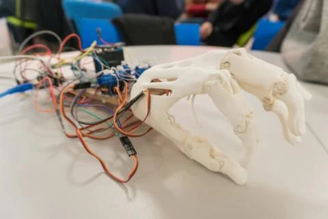 Robotics. Close-up of a robot arm made of nanomaterial. Stock Photos