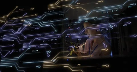 Robotics engineer reaching and lifting drone in lab, inspecting motors for Stock Footage 318143500