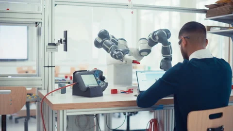 Robotics Engineer Uses Laptop Computer Stock Footage 187571438