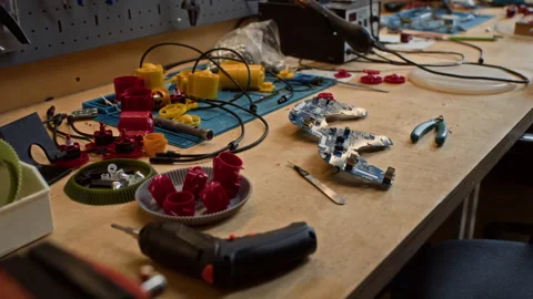 Robotics Engineering Tools and Components Lying on Workbench Stock Footage 343501505