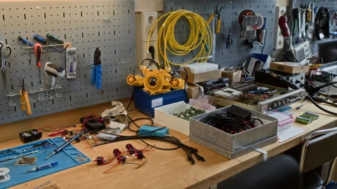 Robotics Laboratory Workbench Displaying Tools with Robotic Parts Stock Footage 343500165