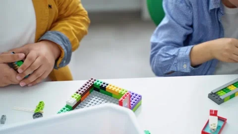 Robotics programming class. Children construct and code Robot. STEM education Stock Footage 236315614