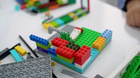 Robotics programming class. Children construct and code Robot. STEM education Stock Footage 239462553