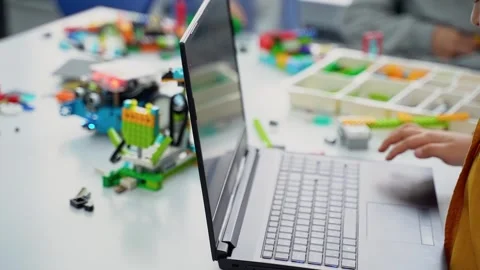 Robotics programming class. Children construct and code Robot. STEM education Stock Footage 241149711
