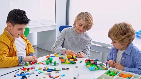 Robotics programming class. Children construct and code Robot. STEM education Stock Footage 246124948