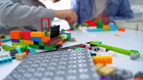 Robotics programming class. Children construct and code Robot. STEM education Stock Footage 246125013