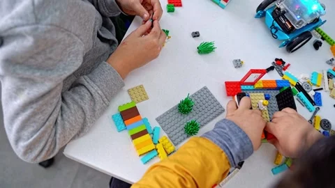 Robotics programming class. Children construct and code Robot. STEM education Stock Footage 247781715