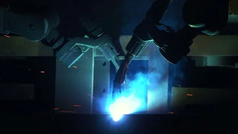 Robotics work in production line of car parts at factory 库存影片 78389217