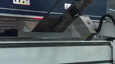 Тhe robotized machine processes the sheet of iron Stock Footage 58292230