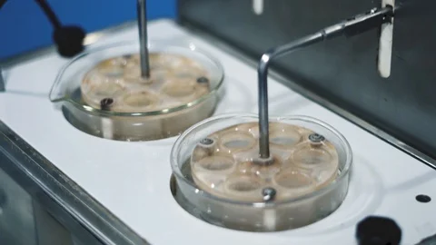 Robotized machinery on testing medicine capsules used in pharmaceutical Stock Footage 118916771