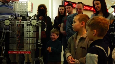 Robot.New technologies.   AI. Children playing with robots. Stock Footage 50302992