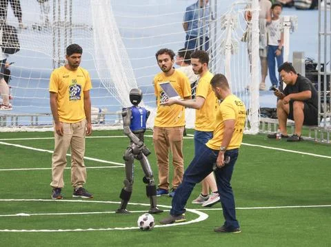 Robots and engineers prepare for 2nd World Humanoid Robot Games in Beijing Stock Photos