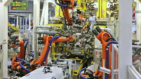 Robots in a car factory Stock Footage 52602975