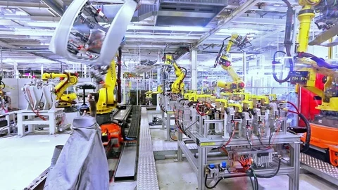Robots in a car plant Stock Footage 71379175