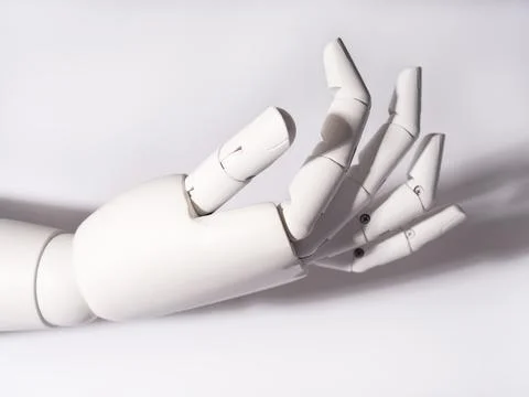 The robot's hand is on a white background Stock Photos